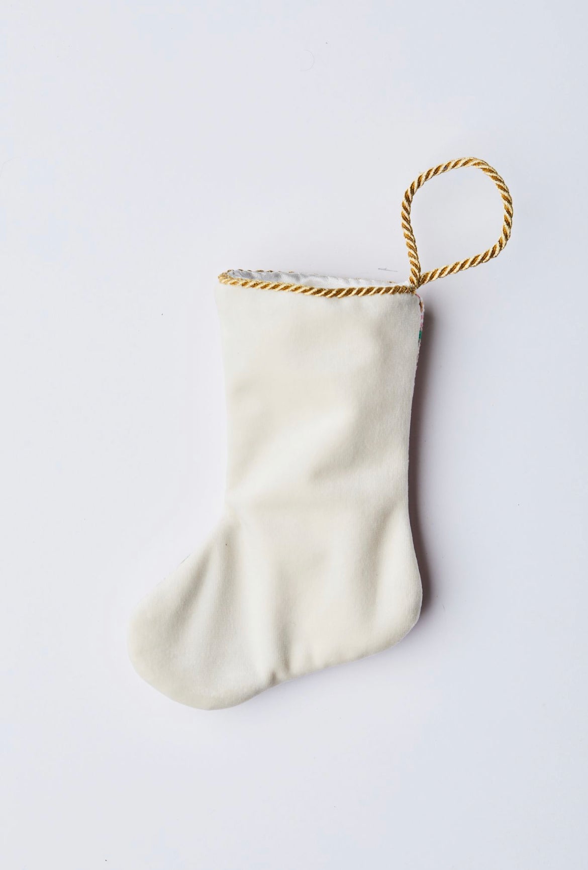 Back view of Sugary Sweet Nutcracker in Pink needlepoint stocking with solid white velvet backing