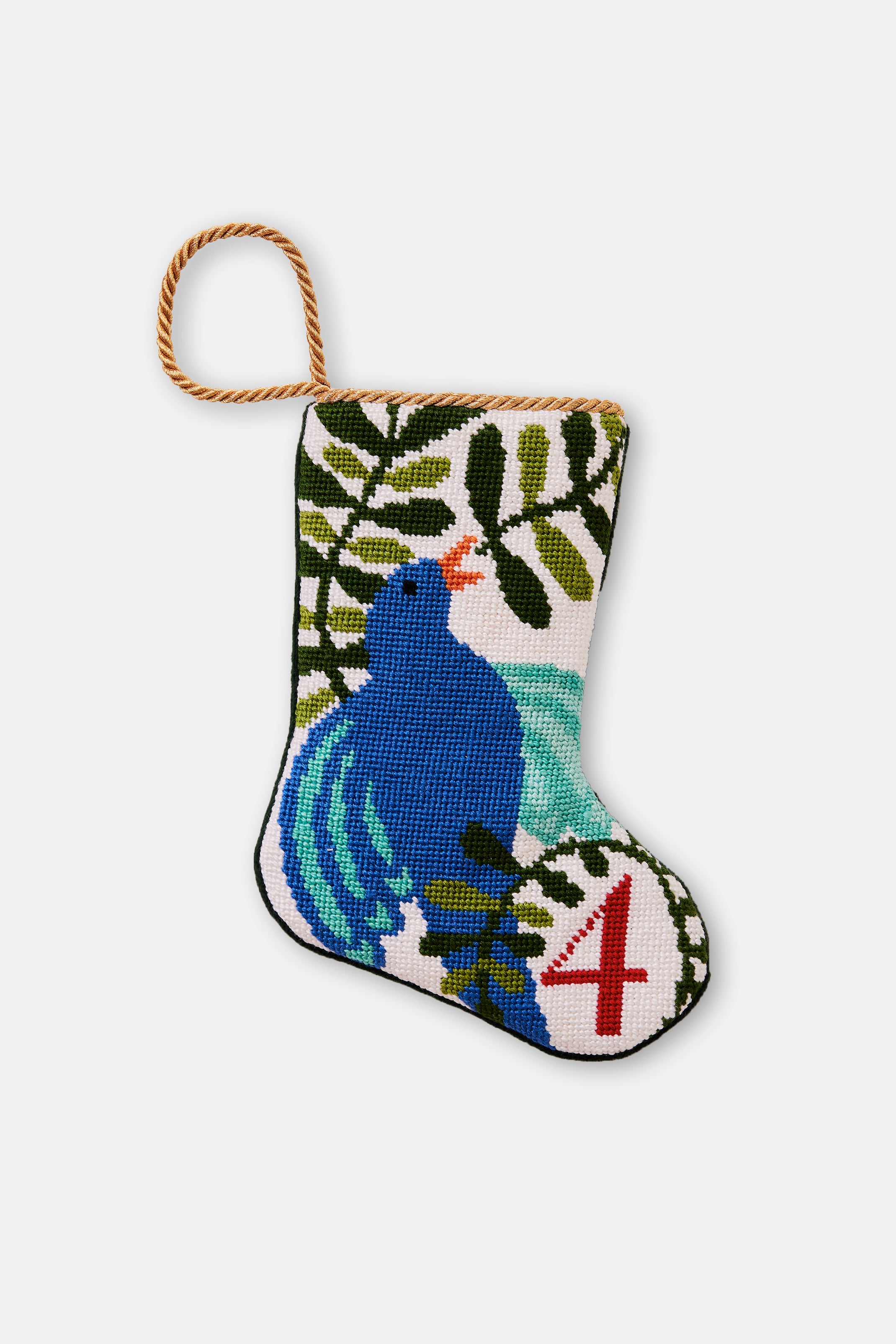 Hand-stitched needlepoint stocking featuring a blue bird with a lush green background