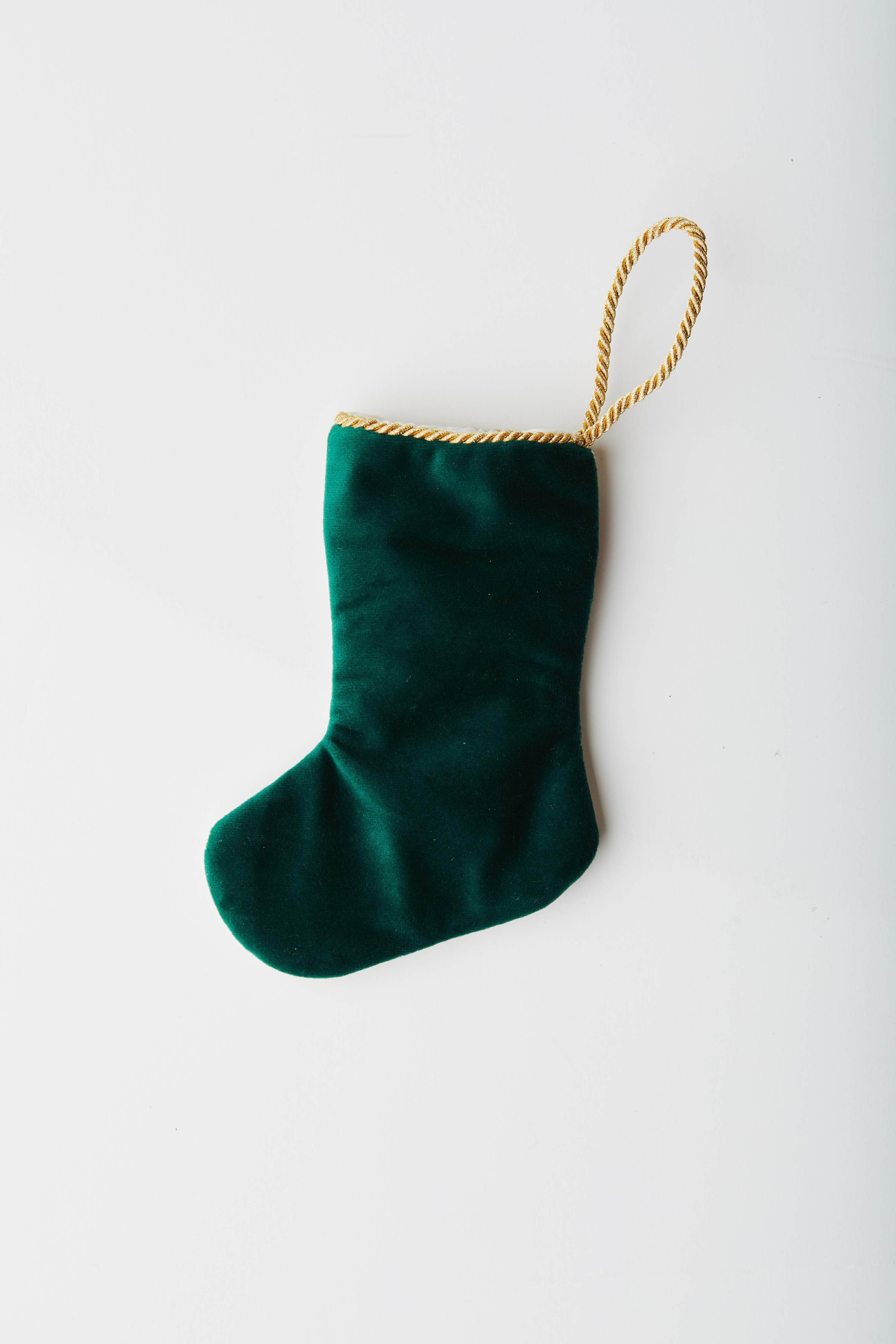 Back view of Golfing Nutcracker needlepoint stocking with solid green velvet backing