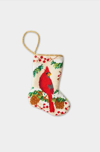 Christmas Cardinal needlepoint stocking with red cardinal perched among holly, pinecones, and festive greenery