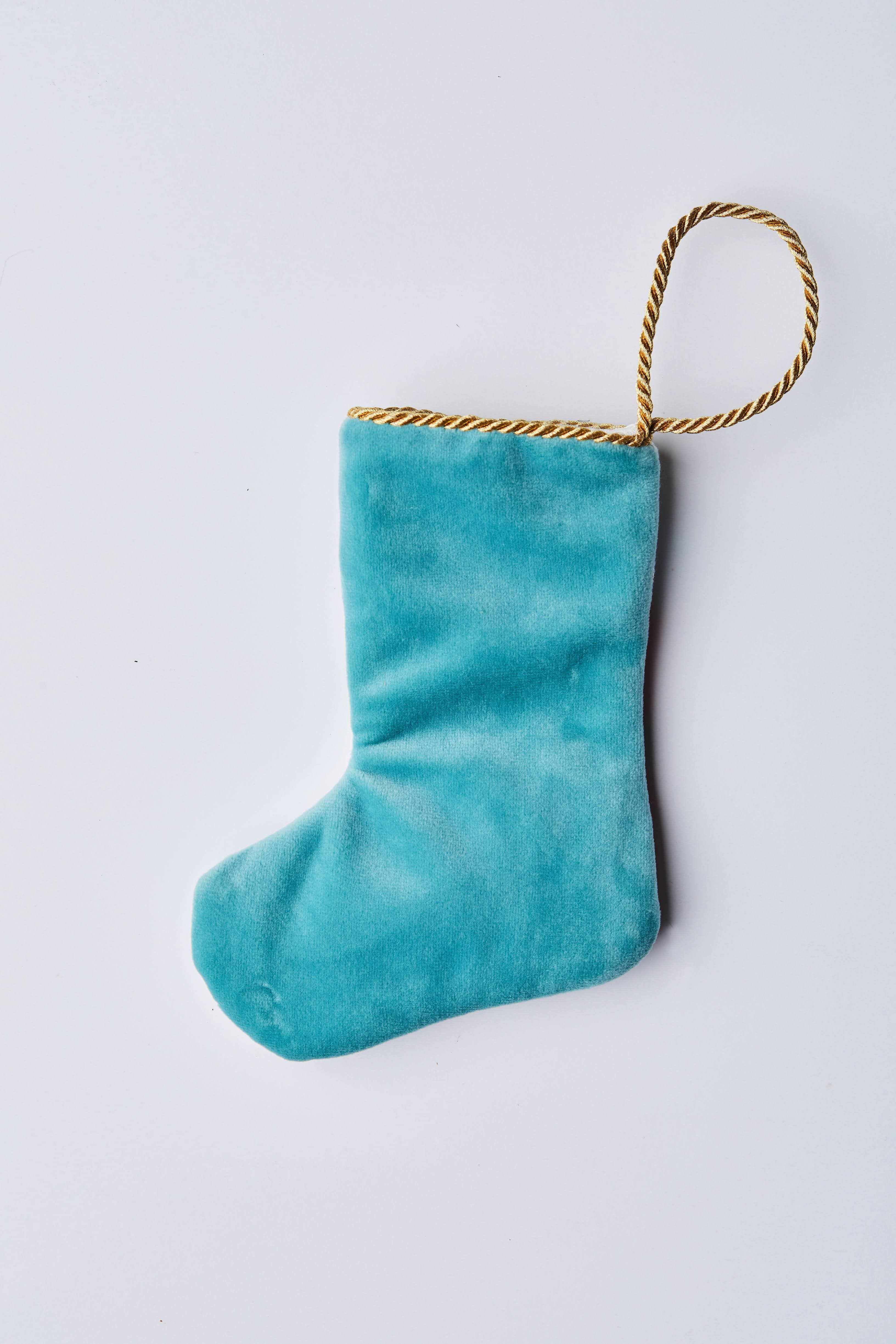 Back view of Friend of Frosty needlepoint stocking with solid blue velvet backing