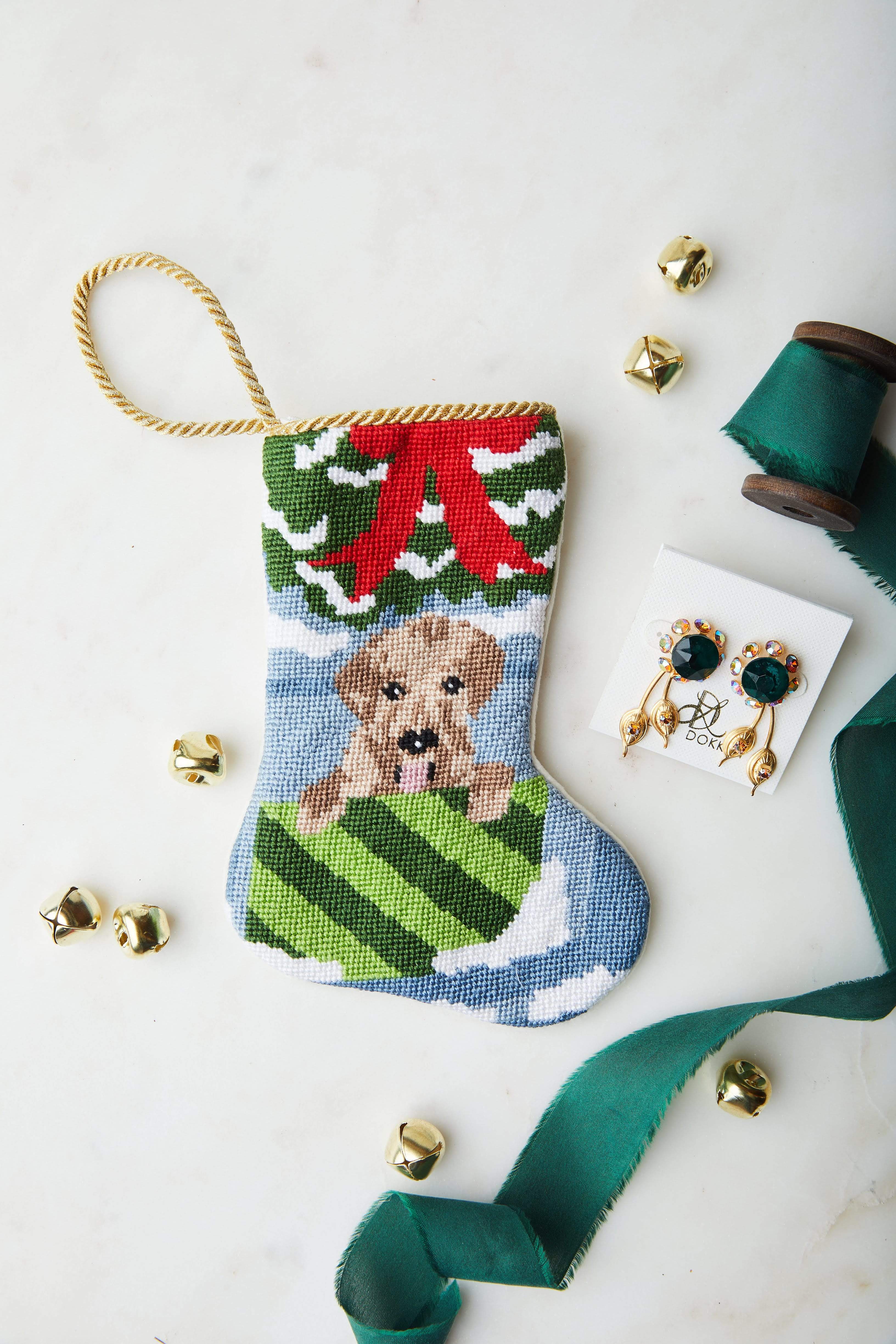 Bauble Stockings styled with green lace and festive pup-themed decor