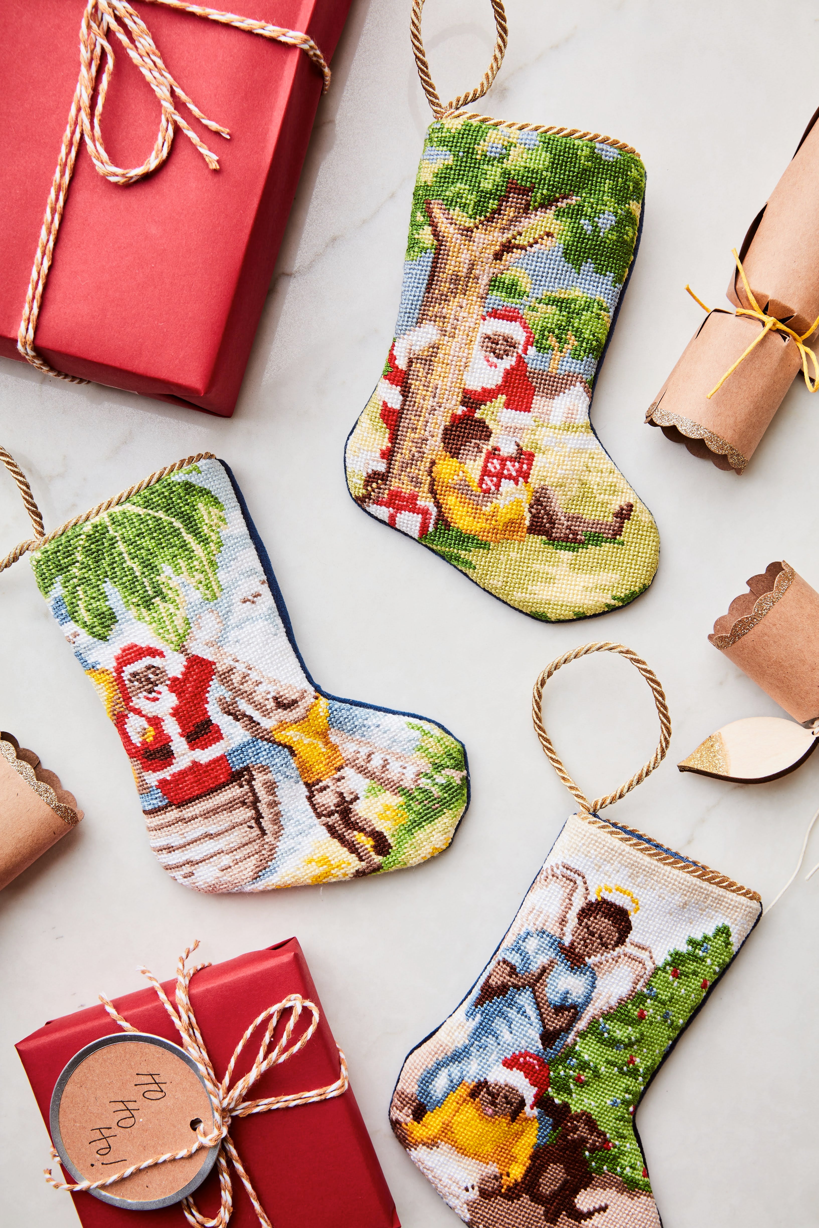 Festive display featuring Special Delivery Santa, together with other Christmas-themed stockings