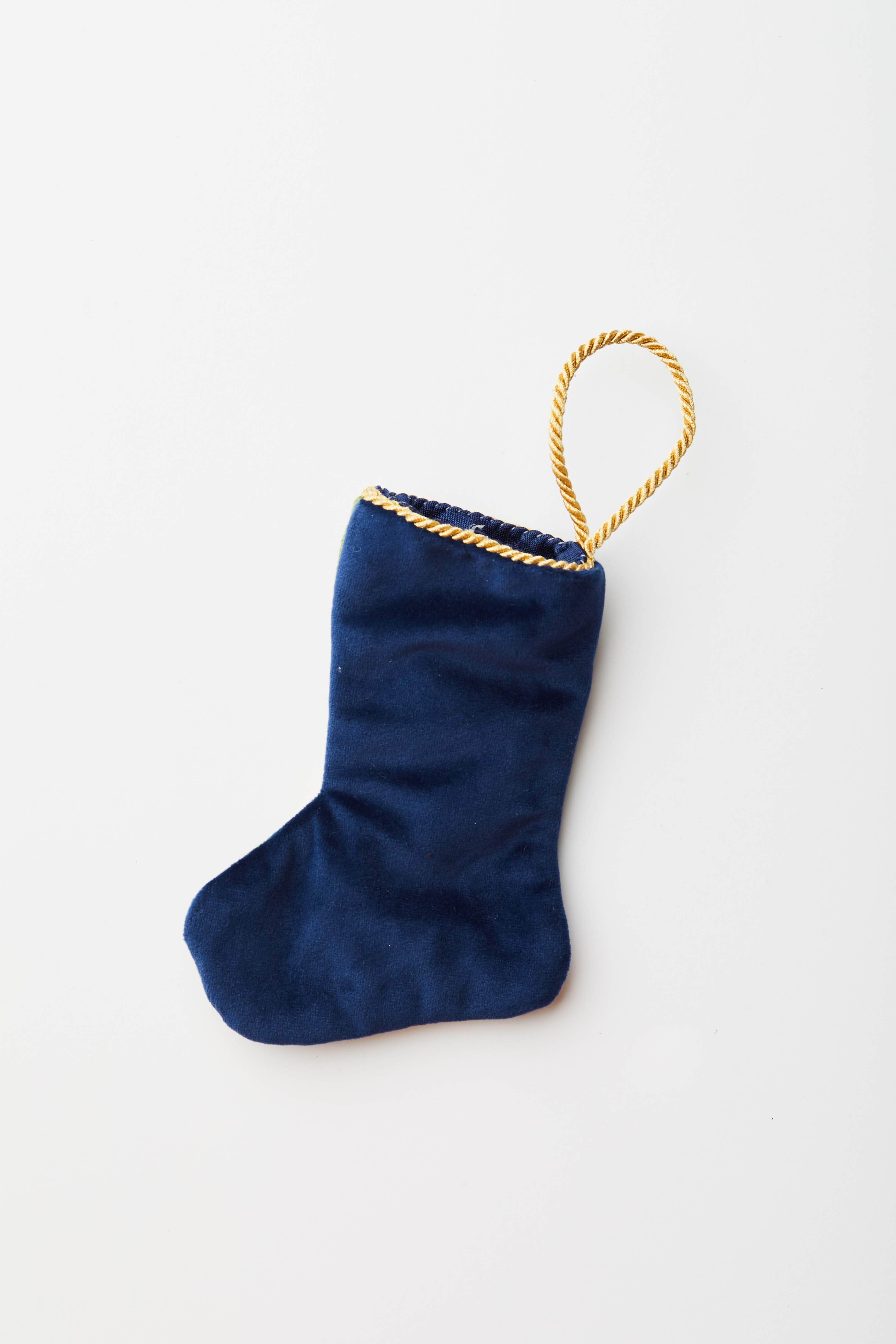 Back view of Winter Wonderland needlepoint stocking with solid navy blue velvet backing