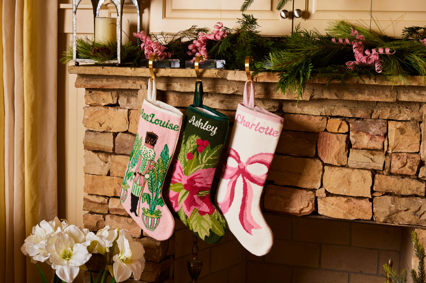 Bauble Stockings miniature hand-stitched needlepoint stocking on a tree