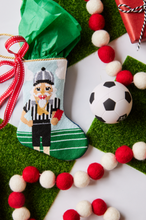Sports-themed Bauble Stockings styled with sporty holiday accents and soccer ornaments