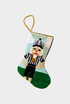 Hand-stitched stocking with sports-themed referee nutcracker in striped uniform with whistle on festive green field