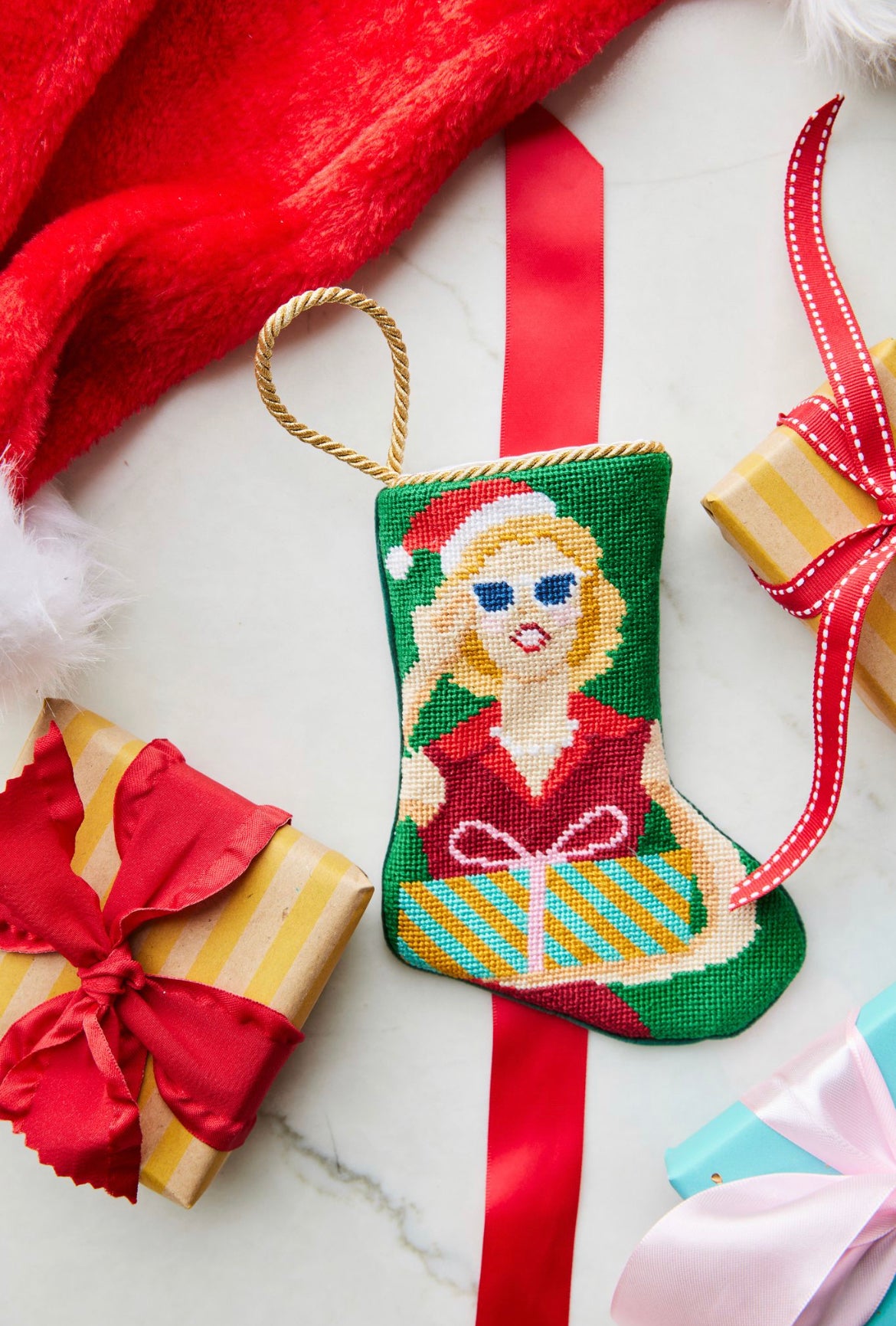 Bauble Stockings featuring Mrs. Claus styled with bold red festive background and holiday decor