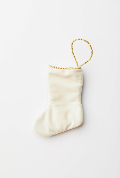 Back view of Carol of the Bells needlepoint stocking with solid white velvet backing