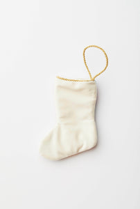 Back view of Carol of the Bells needlepoint stocking with solid white velvet backing