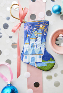 Celebration Castle Bauble Stockings surrounded by vibrant holiday-themed decor.