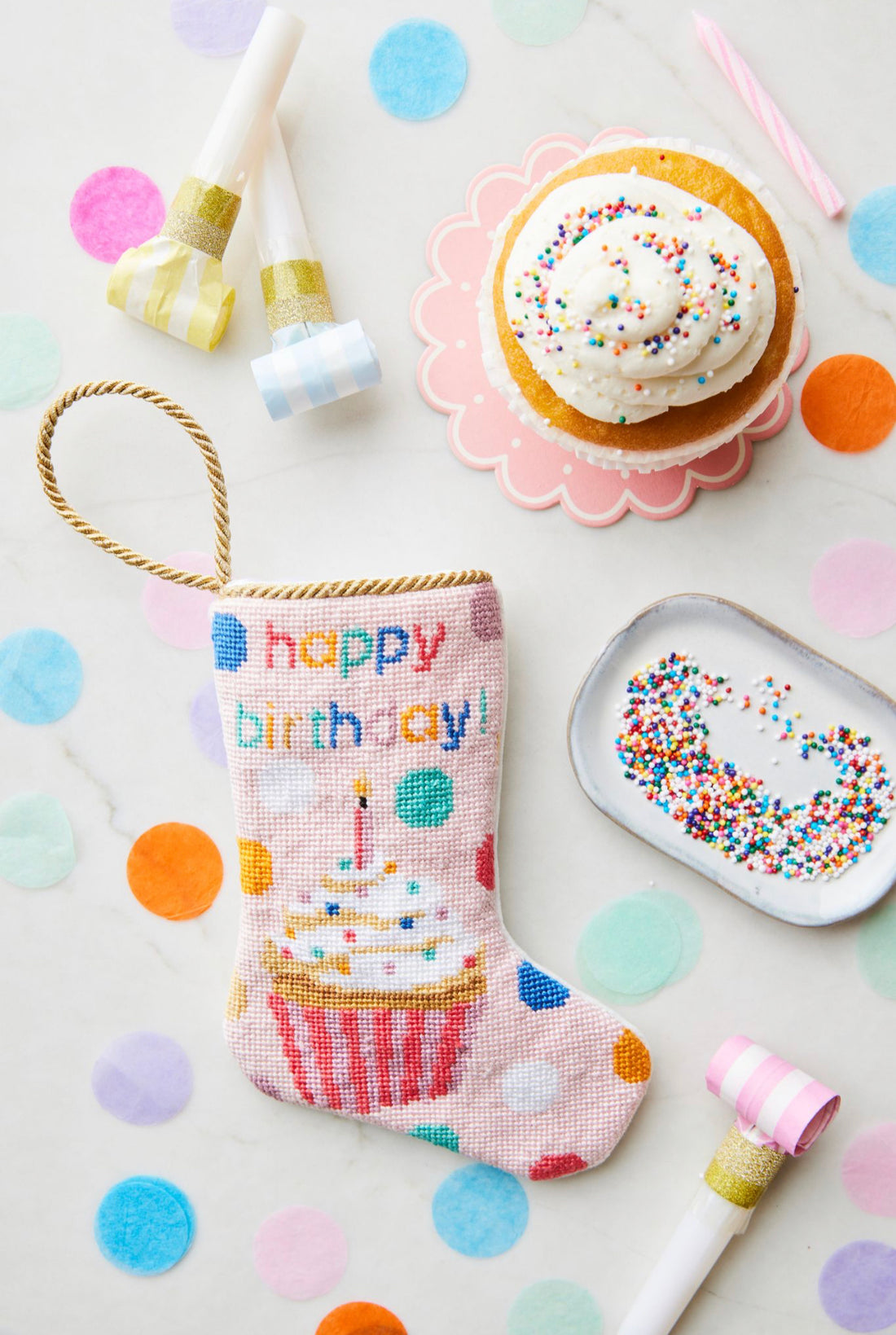 Bauble Stockings displayed with colorful confetti and cupcake in a festive birthday setting