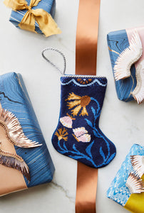 Decorated background featuring Butterfly Beauties Bauble Stockings with festive details