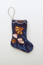 Hand-stitched Bauble Stockings featuring colorful butterflies and floral blooms on navy blue background