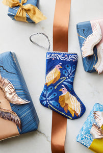Quintessential Quail Bauble Stockings on white holiday-themed backdrop