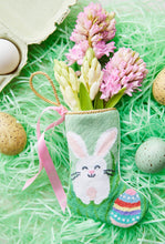 Easter-themed Bauble Stockings with spring greenery and pastel Easter decor