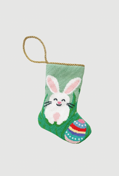 Needlepoint Bauble Stockings featuring Easter bunny and colorful Easter egg on spring green backdrop