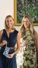 Sarah Tucker and Molly Boyd holding Bauble Stockings