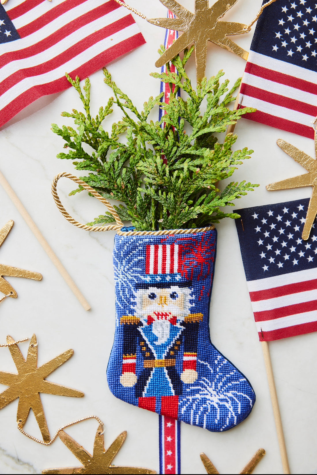 Hand-stitched Bauble Stockings displayed alongside American flag and holiday-themed decor