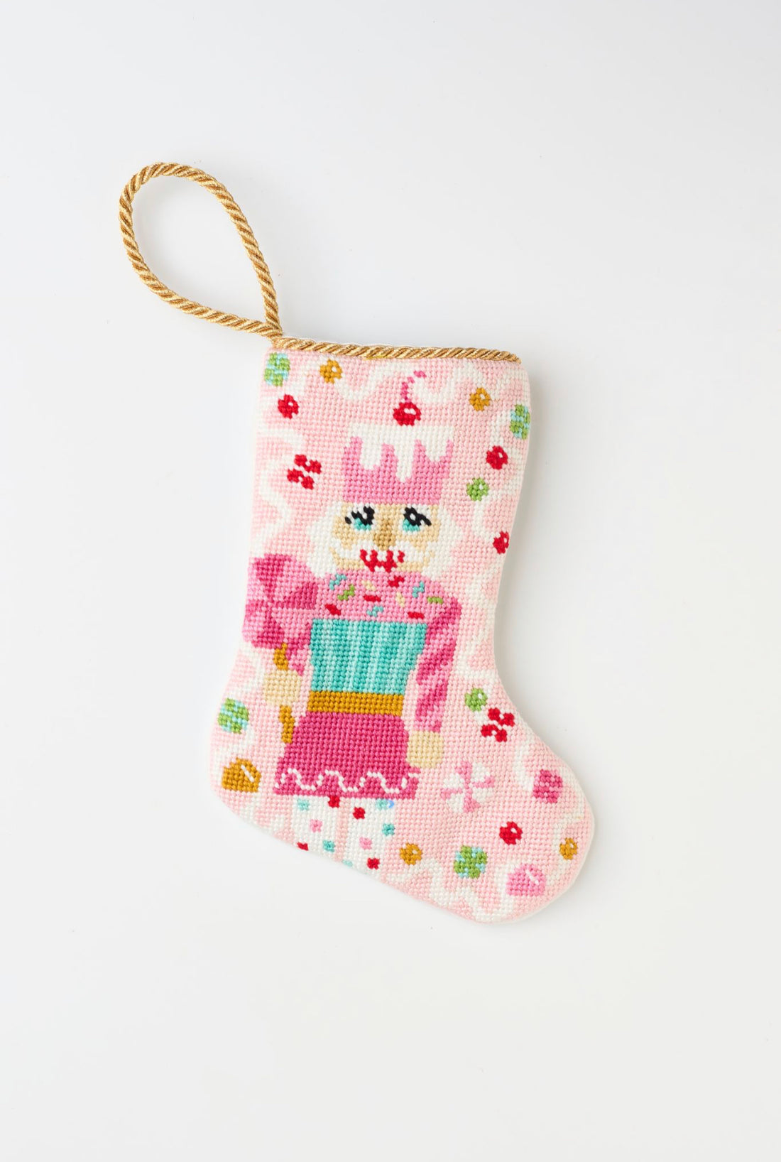 Hand-stitched Bauble Stockings showcasing a sweet-themed nutcracker with colorful festive accents