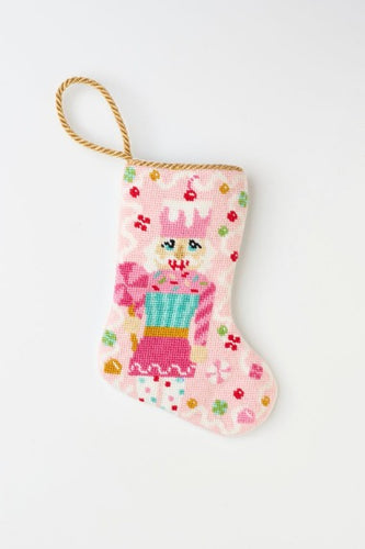 Hand-stitched Bauble Stockings showcasing a sweet-themed nutcracker with colorful festive accents