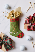 Hand-stitched stocking styled with golf tees and holiday-wrapped golf-themed gifts