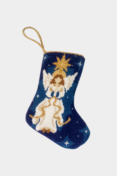 Hand-stitched stocking featuring the Angel of the Lord with gold accents, set on a navy blue background with glittering stars