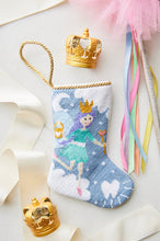 Tinsel Tooth Fairy Bauble Stockings decorated with colorful accents and playful holiday props