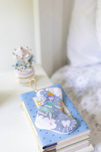 Tinsel Tooth Fairy Bauble Stockings arranged in playful holiday-themed flat lay with colorful accents