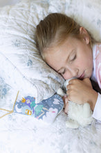 Festive bedtime scene with Tinsel Tooth Fairy Bauble Stockings in cozy sleeping holiday setting