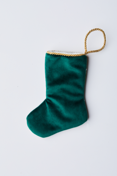 Back view of Triumphant Tulip in Pink needlepoint stocking with solid green velvet backing