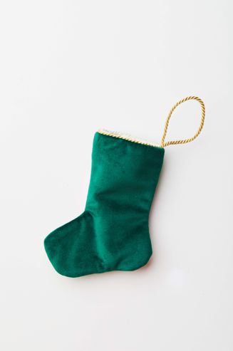 Back view of Old St. Nick in Green needlepoint stocking with solid green velvet backing