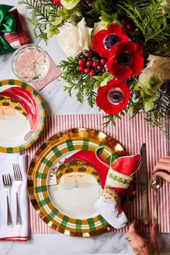 Bauble Stockings styled on festive Christmas table with Santa plates, red accents, and greenery