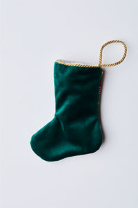 Back view of Old St. Nick in Stripes needlepoint stocking with solid green velvet backing