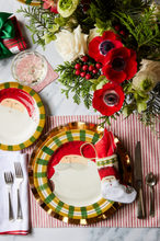Bauble Stockings displayed on Christmas table setting with greenery, Santa plates, and red holiday accents