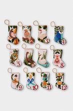 Full set of 12 hand-stitched needlepoint stockings featuring a unique design for each of the "12 Days of Christmas." Each stocking showcases vibrant colors with intricate designs