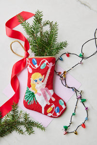 Bauble Stockings displayed with holiday-themed decorations and festive accents