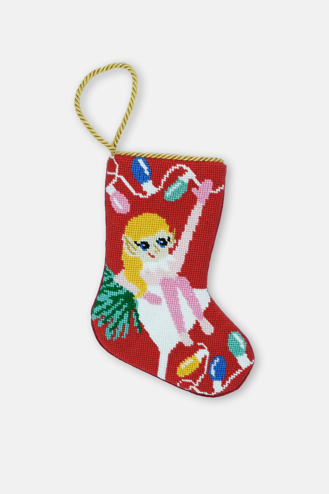 Hand-stitched stocking featuring a cocktail-loving elf with a martini glass on a red background