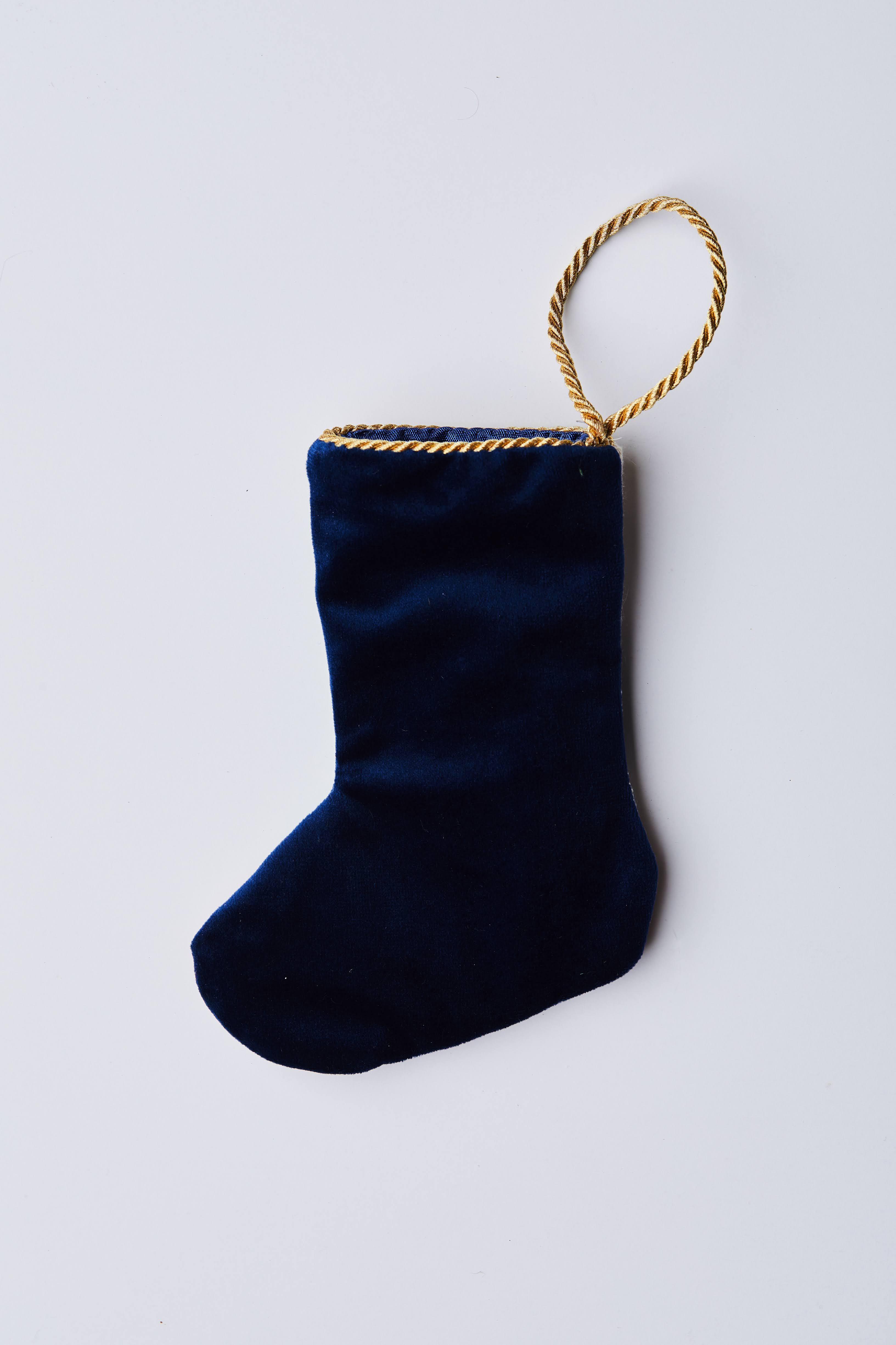 Back view of the Celebration Castle Bauble Stockings with solid navy blue velvet backing