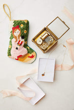 Bauble Stockings in a gift-themed setting