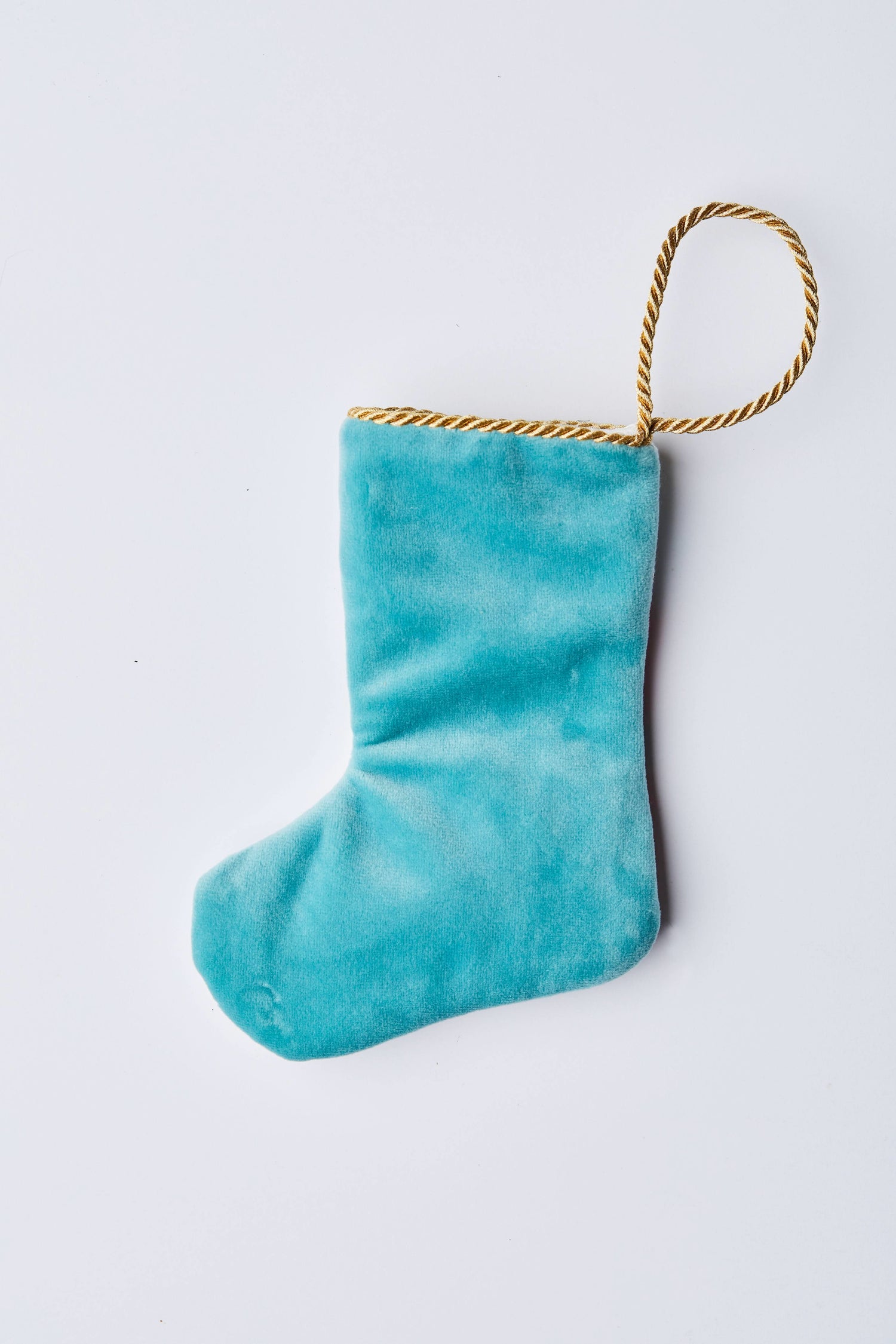 Back view of Friend of Frosty needlepoint stocking with solid blue velvet backing