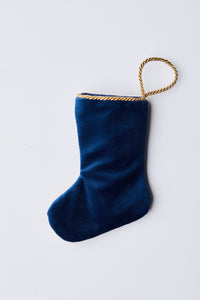 Back view of Gifting Nutcracker needlepoint stocking with solid navy blue velvet backing