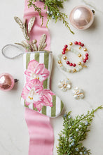 Bauble Stockings displayed with a pink lace and festive accessories with floral accents