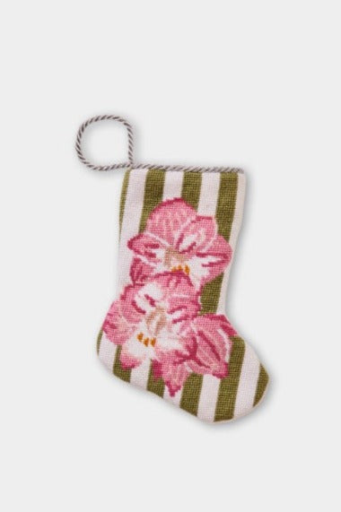 Hand-stitched Bauble Stockings featuring pink amaryllis flowers on a striped green and white backdrop