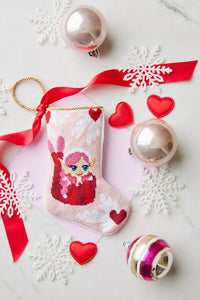 Bauble Stockings displayed with holiday-themed decorations and heart ornaments