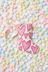 Bauble Stockings displayed with pastel-colored candy hearts and a festive, heart-filled holiday vibe