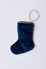 Back view of Jolly Old St. Nick needlepoint stocking with solid navy blue velvet backing