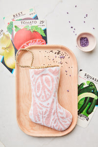 Bauble Stockings styled with festive stationery for a cozy holiday scene