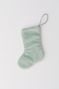Back view of Peace on Earth in Blue needlepoint stocking with solid mint green velvet backing