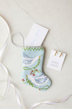 Bauble Stockings with holiday tags in a gift-themed decor